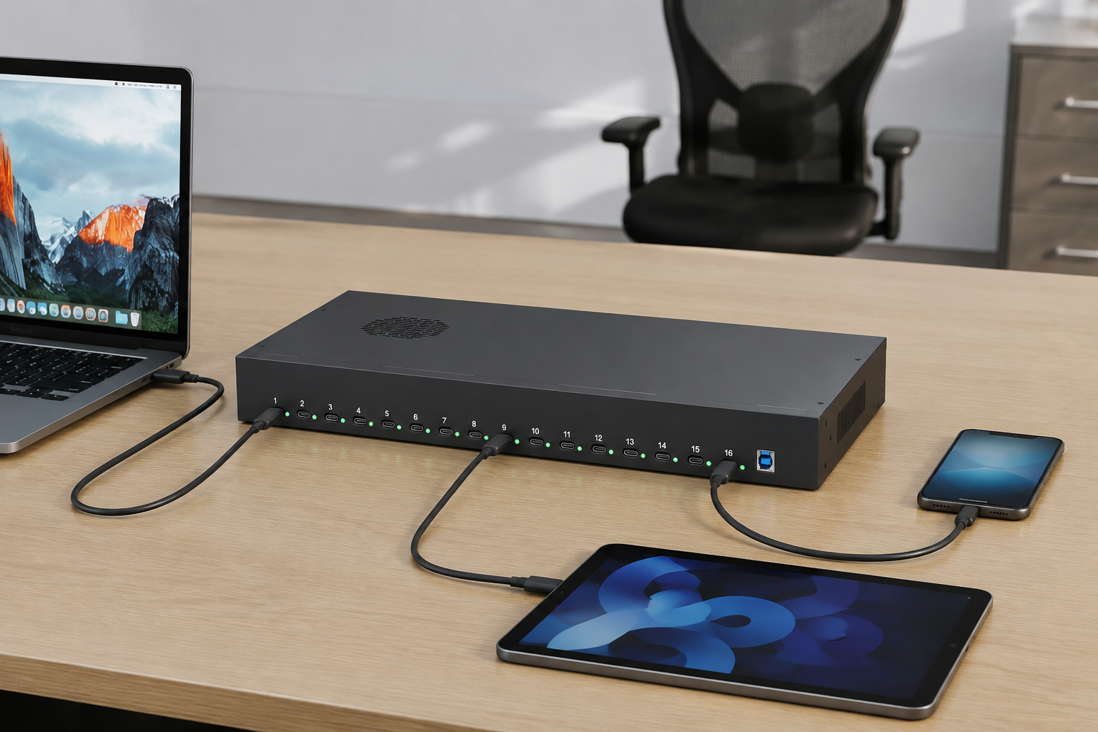 USB charging hub on professional desk with multiple devices